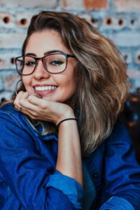 closeup-photo-of-smiling-woman-wearing-blue-denim-jacket-smiling