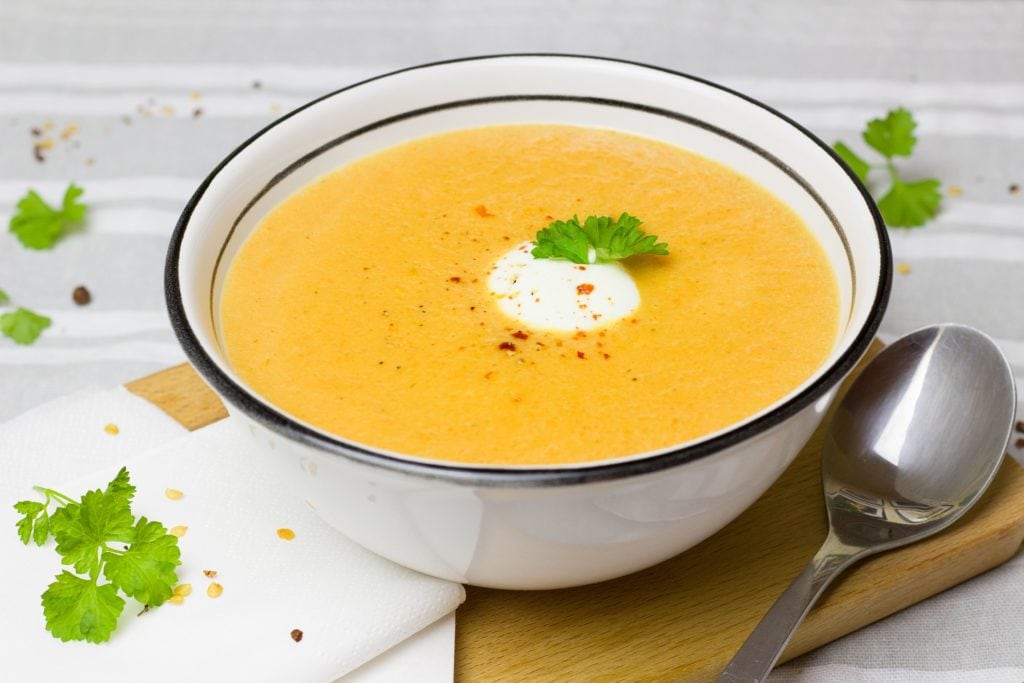 orange soup in a bowl