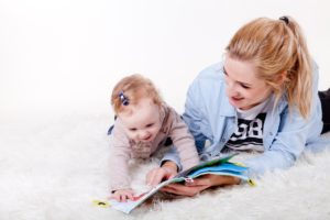 mother reading to her child